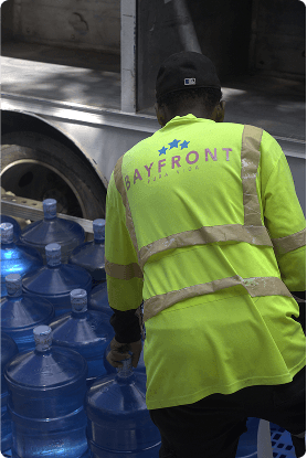 Person loading water bottles